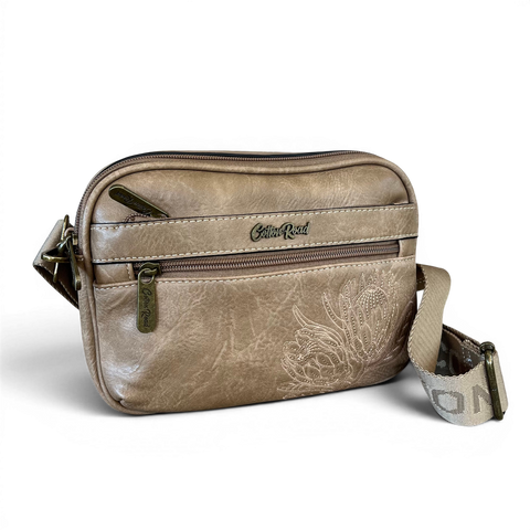Cotton Road Sling Bag khaki PU leather crossbody with embroidered Protea and branded adjustable strap