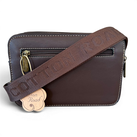 Coffee brown Cotton Road Sling Bag in PU leather with embossed front panel and branded strap