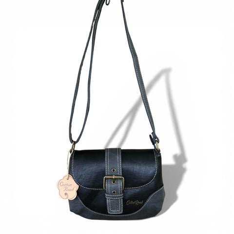 Black Cotton Road Sling Bag in PU leather with buckle clip and adjustable strap