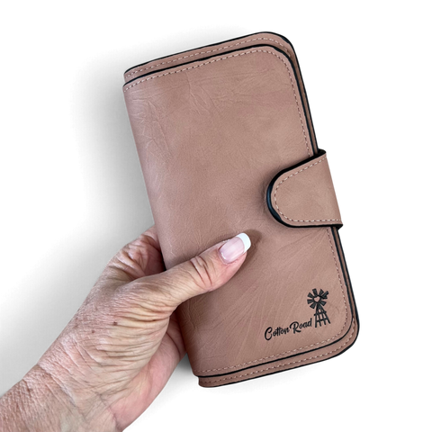 Cotton Road Wallet in soft pink PU leather with stitched edges, clip closure and windmill logo detail.