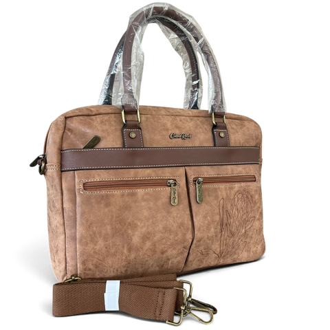 Cotton Road Laptop Bag in brown PU leather with contrast trim, twin handles, front zip pockets and Protea embossing