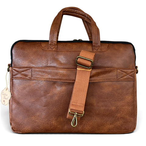Cotton Road Laptop Bag in brown PU leather with padded design, dual handles and adjustable shoulder strap