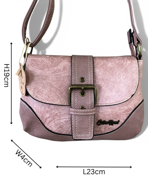 Pink Cotton Road Sling Bag in PU leather with adjustable strap and buckle clip closure