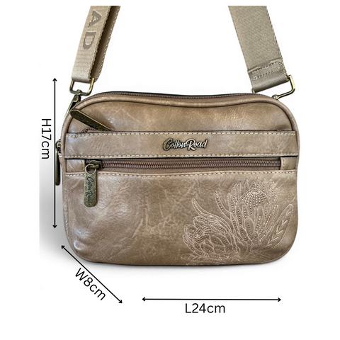 Cotton Road Sling Bag khaki PU leather crossbody with embroidered Protea and branded strap
