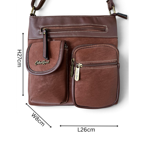 Brown Cotton Road sling bag made of PU leather with multiple zip and magnetic pockets and adjustable shoulder strap