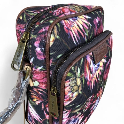 VIVACE Sling Bag: BLACK Canvas Sling Bag with BROWN TRIM and PROTEAS