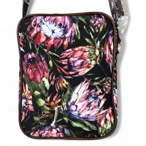 VIVACE Sling Bag: BLACK Canvas Sling Bag with BROWN TRIM and PROTEAS