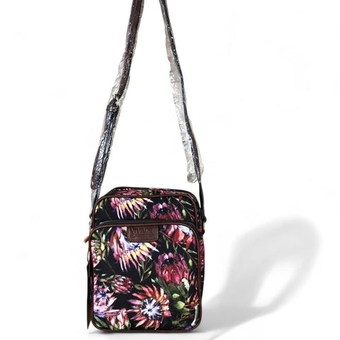 VIVACE Sling Bag: BLACK Canvas Sling Bag with BROWN TRIM and PROTEAS