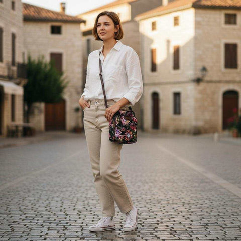 VIVACE Sling Bag: BLACK Canvas Sling Bag with BROWN TRIM and PROTEAS
