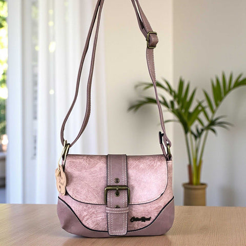 Pink Cotton Road Sling Bag in PU leather with adjustable strap and buckle clip closure